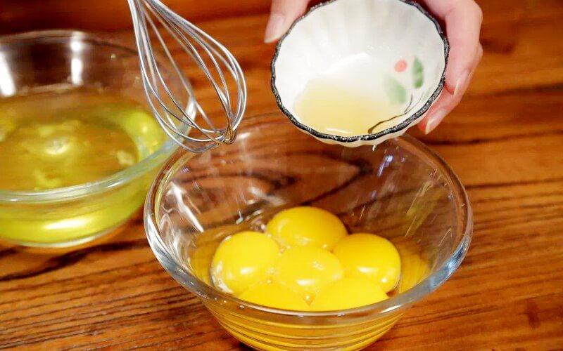 How do you separate an egg to get egg whites and egg yolk